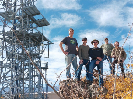 Group from SkyHubLink on Buckhorn Mountain near the tower with their newly installed repeater